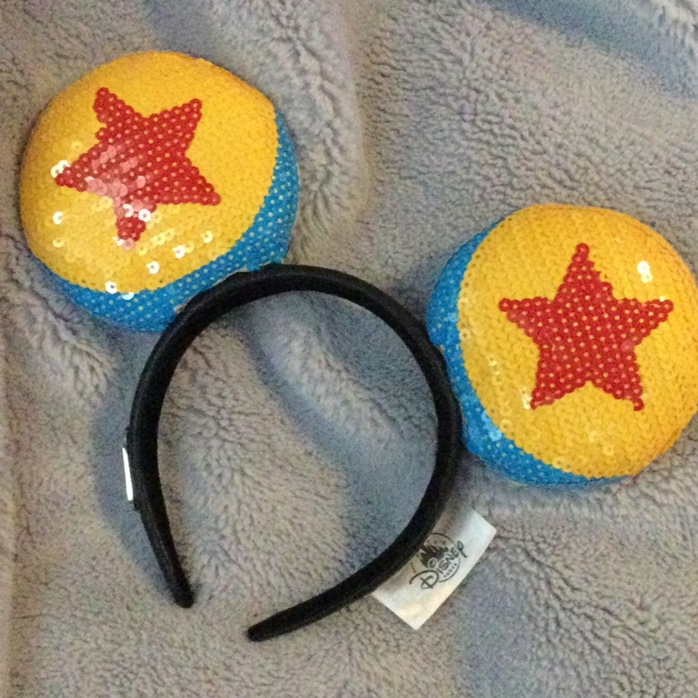 Loungefly Pixar Mickey ears. New without tags; worn once.
